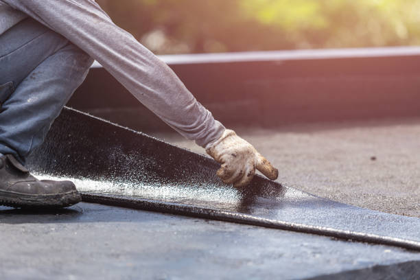 Professional Waterproofing technician working in Jackson, MI
